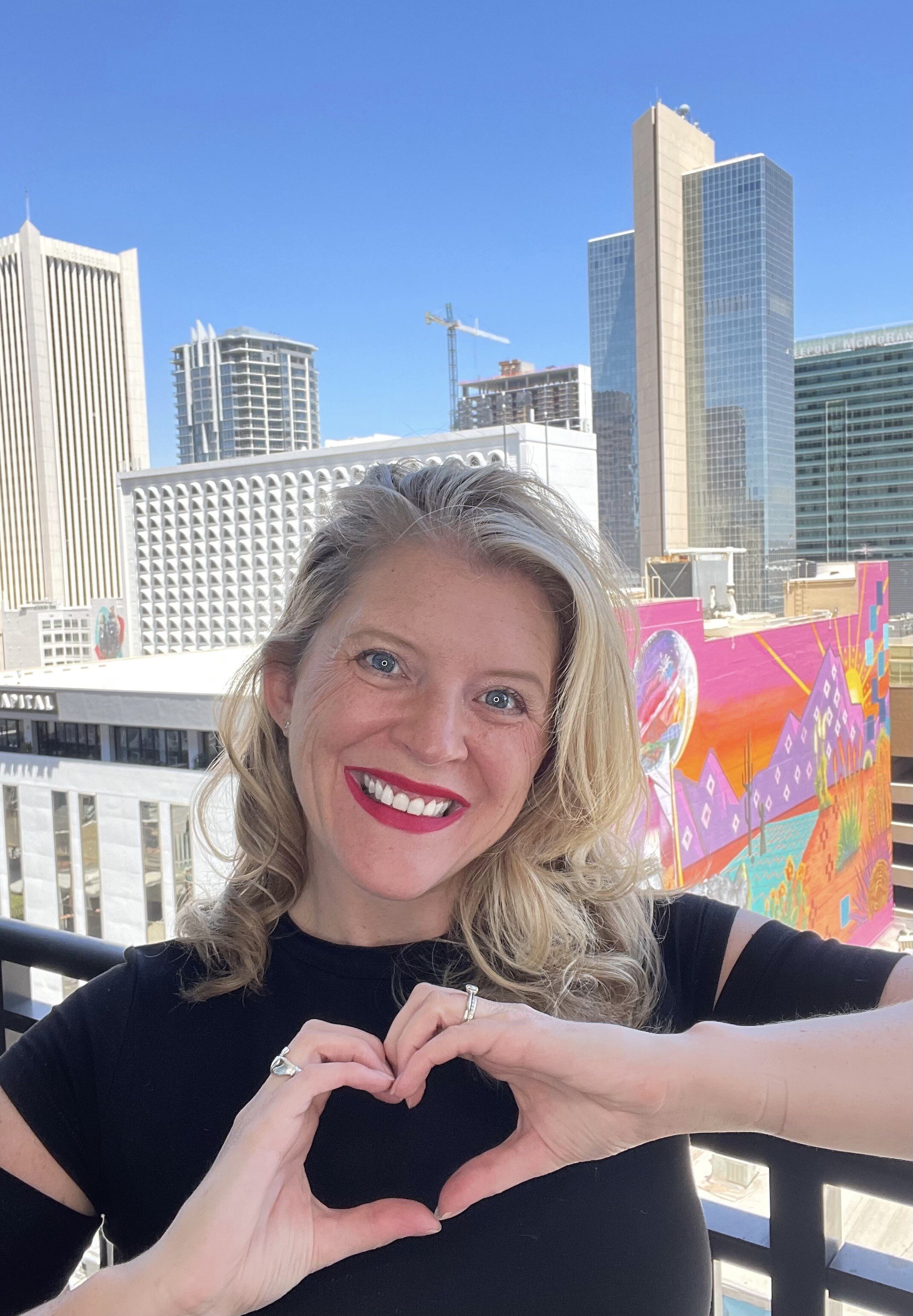 Nikki with the downtown Phoneix Skyline.